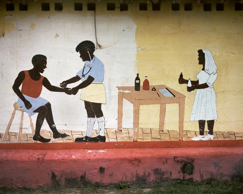 Color image of a painted mural of three figures; one figure administers a vaccine to another white a third figure holds two bottles in her hands